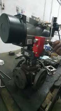 Actuator operated 4 way ball valve