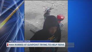 Man robbed at gunpoint while trying to help panhandling teens