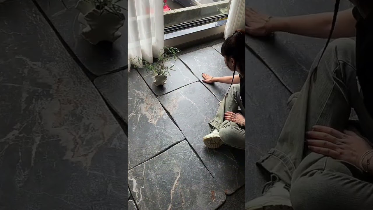 Laying stone tiles with perfect alignment every piece fits smooth the floor looks clean 