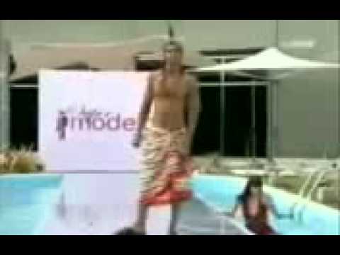 Model Falls Off Catwalk Into The Pool!