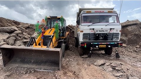 Jcb 3dx backhoe mud loading in tata tipper 1618 l and murum loading l