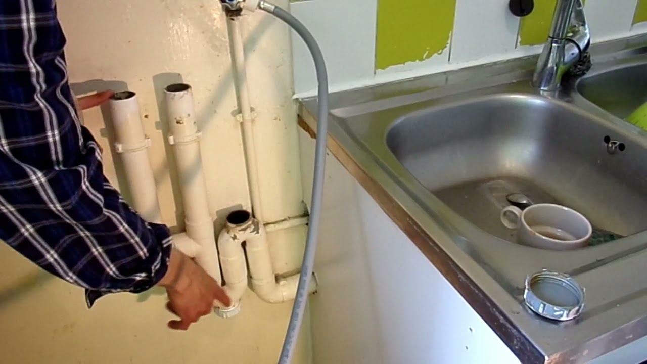 comment déboucher l'évacuation du lave linge avec du bicarbonate et du vinaigre