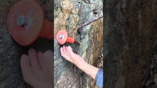 splitting a rock containing pieces of rare items