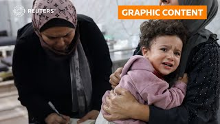 GRAPHIC CONTENT WARNING: Palestinians mourn after deadly Israeli strikes across Gaza | REUTERS