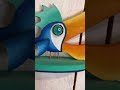 From bottle cap to surfing toucan. #woodart #toucanbird #surfing #funkyart #whimsicalart #beachart