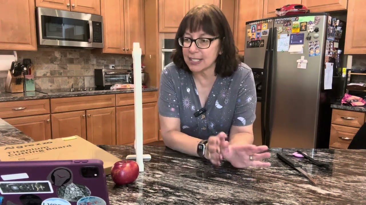 2-sided cutting board with built in sharpener and stand!