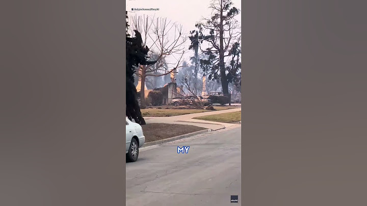 Man stunned as his LA home survives fire