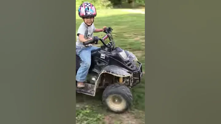 Four year old riding a 110