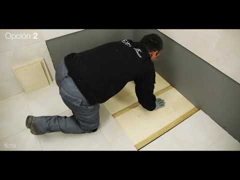 installation-von-mineralgussduschwannen-der-firma-fiora-auf-holzfußböden