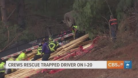 Firefighters rescue trapped driver on Interstate 20
