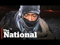 Shivering Refugee Discovered Crossing into Canada