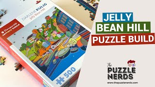 Jelly Bean Hill 500 piece puzzle by artist, Darlene Kulig - The Puzzle Nerds screenshot 1