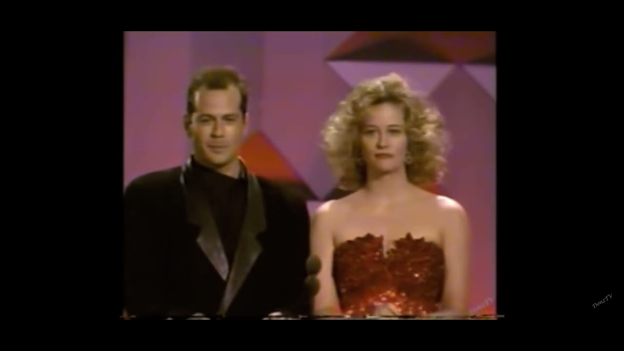 Download Cybill Shepherd and Bruce Willis presenting at the 1986 Emmy Awards