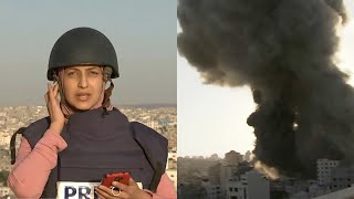 Al Jazeera journalist reports live as building hit by Israel airstrike