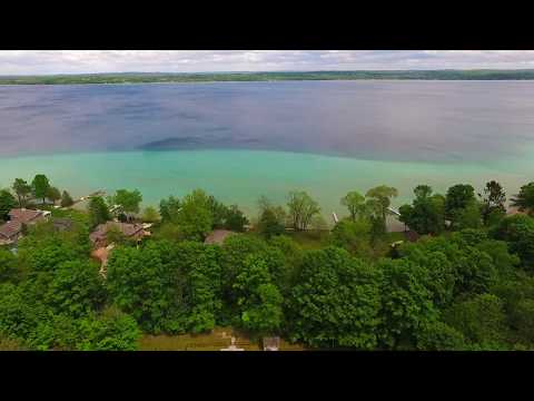 9253 SW Torch Lake Dr, Rapid City, MI home video tour