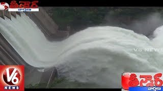 Srisailam project 7th gate lifted after flood water increase | teenmaar news