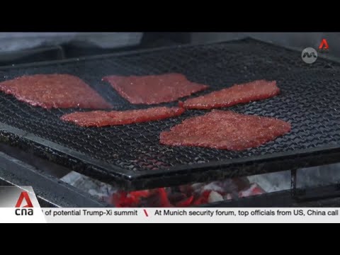 Chinese New Year: Sellers of barbecued pork slices keep prices steady by absorbing costs