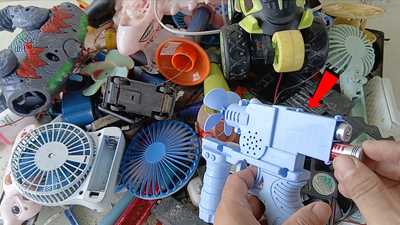 Explore the pile of old things - meet the old mini fan and the super weird toy