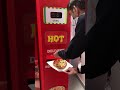 Yess pizza vending machine dispensing pizza under 3 mins