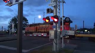 (Northbound) BNSF J.B.L.M. Flatbed Train passes through the Lakeview 100TH Street Railroad Crossing.