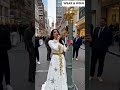 “Model Applies Lipstick on Wall Street NYC 2025 | Bold Street Fashion Experiment &amp; Public Reactions”