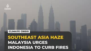 Malaysia urges Indonesia to curb forest fires as toxic haze shuts schools