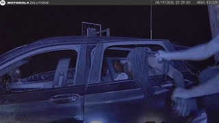 Dashcam footage shows Arkansas State Police officer attempt to drag man out of broken car window aft News