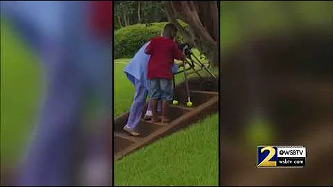RAW VIDEO:  Young boy helps elderly stranger up s 4405270 1200