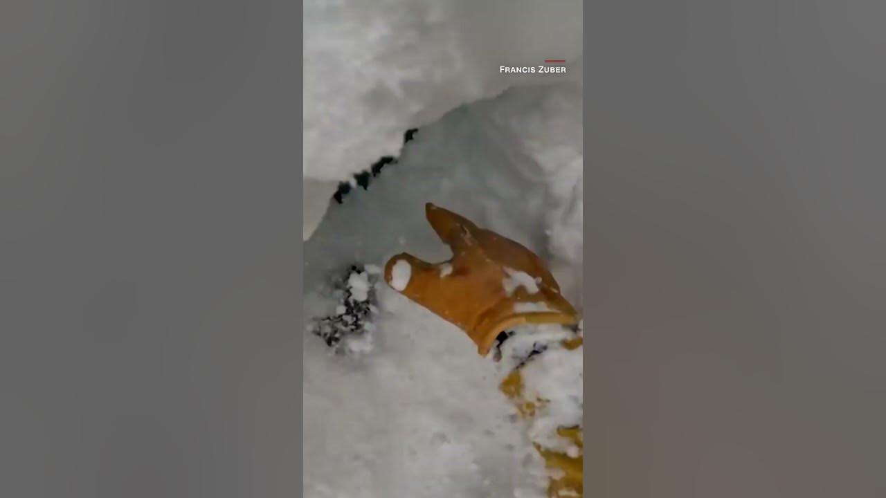 Skier spots snowboarder buried under snow. See what he did next