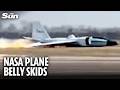 Terrifying moment NASA plane ERUPTS into flames as it touches down without landing gear