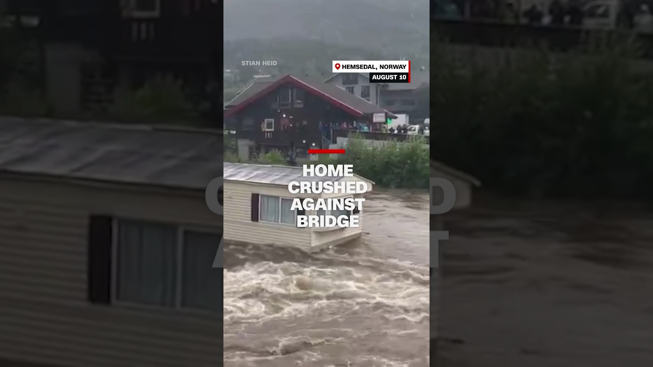 Home crushed against bridge