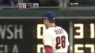 91209 Ryan Howard knocks it down at first, then Chase Utley barehands the ball and throws to first f