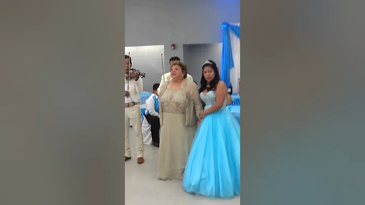 Minerva Aguilar sings with Mariachi band