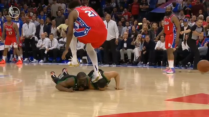 Joel Embiid accidentally steps on Grant Williams' head, causing his face to slam into the ground