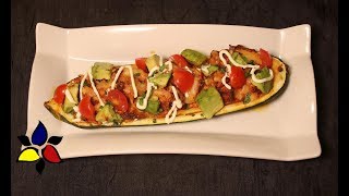 Visit http://www.ketomealsandrecipes.com/recipe/zucchini-boats/ for
the written recipe. tasty chicken enchilada-stuffed zucchini boats
that can be made in le...