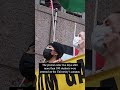 Community members protest outside Columbia's gates