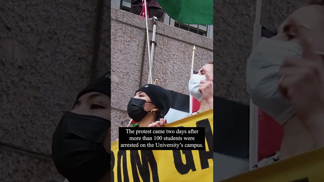 Community members protest outside Columbia's gates