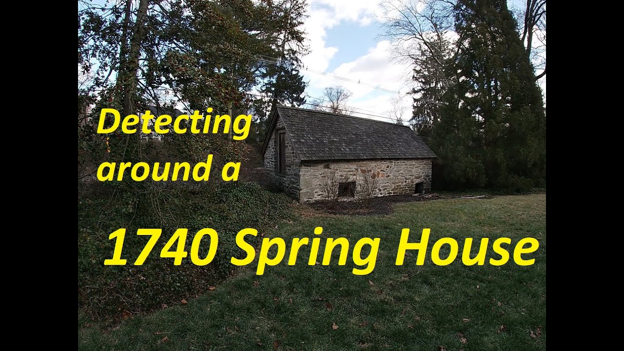 Detecting for treasures around a 1740 Spring House - YouTube