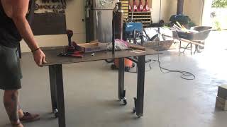 Retractable casters on weld table
