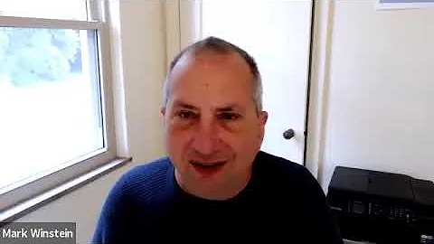Mark Winstein speaks with Michaela Kennedy at the ...
