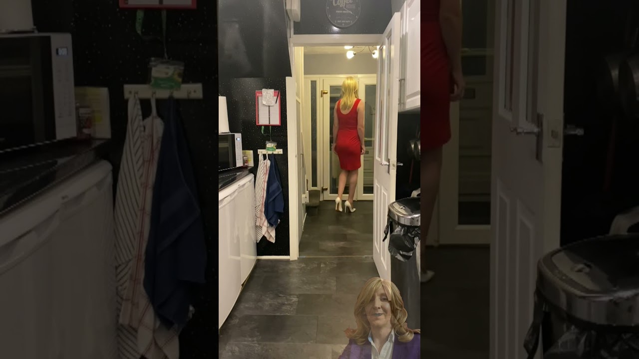 Sarah wearing her new red low cut dress