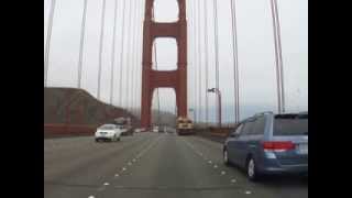 Goggomobil Transporter PickUp microcar crossing Golden Gate Bridge, San Francisco, July 28, 2013