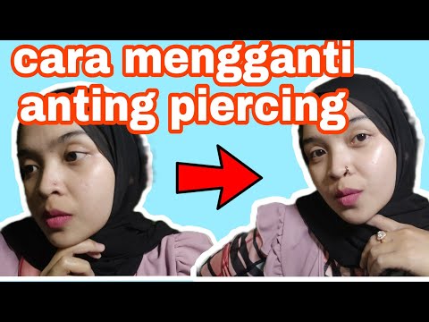 Video: Bagaimana cara mengganti cincin hidung?