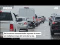 Captado en video: carros bajo agua en San Juan y tapón monumental por la lluvia