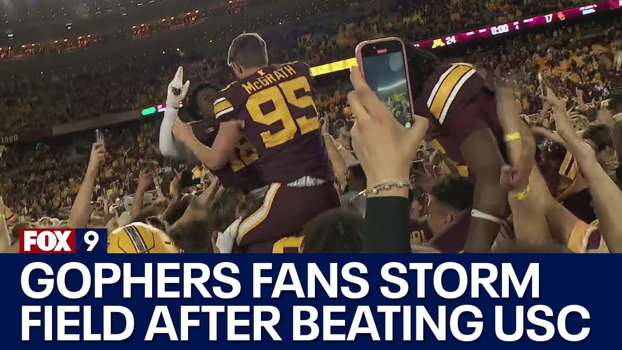 Gophers celebrate upset win over USC with a field rush - YouTube