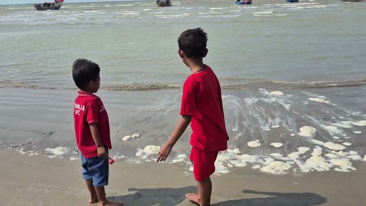 Umam and brother playing truck at the pasar banggi beach of Rembang central java