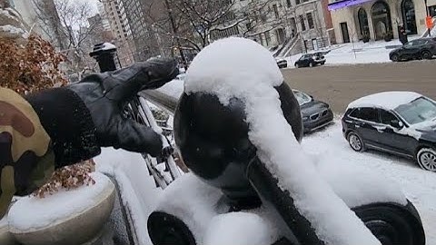 Removing Snow From Concrete Staircase Railing
