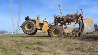 Laying field drainage tile near Fostoria Ohio