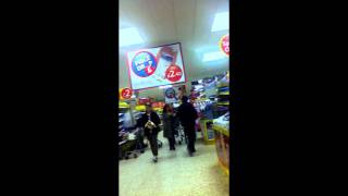 BOY SHOT BY GANG IN TESCO
