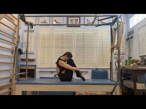 Rolling Back from the Daily Dozen on Pilates' Relaxor Bed (Exercise 3)